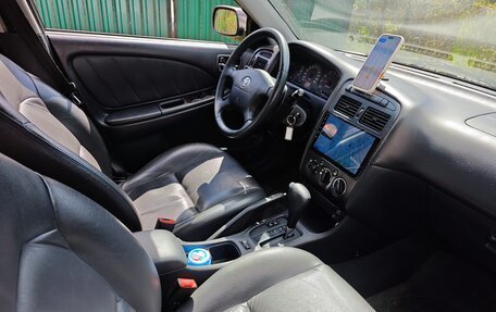Toyota Avensis III рестайлинг, 2001 год, 900 000 рублей, 17 фотография