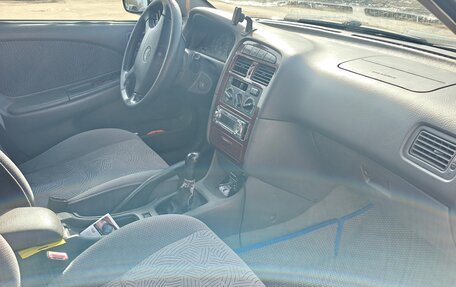 Toyota Avensis III рестайлинг, 1998 год, 190 000 рублей, 14 фотография