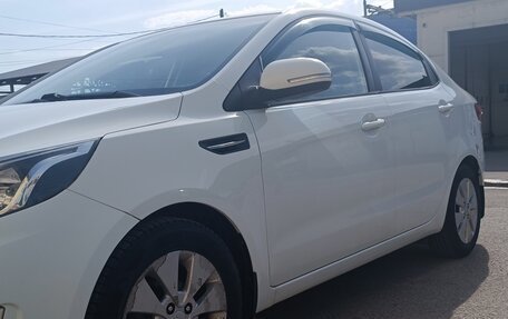 KIA Rio III рестайлинг, 2012 год, 850 000 рублей, 9 фотография