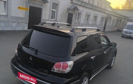 Mitsubishi Outlander III рестайлинг 3, 2004 год, 490 000 рублей, 4 фотография