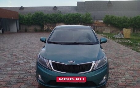 KIA Rio III рестайлинг, 2012 год, 590 000 рублей, 2 фотография