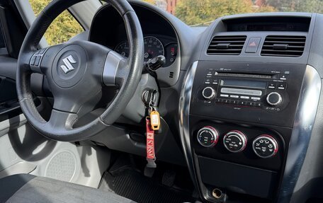 Suzuki SX4 II рестайлинг, 2009 год, 549 000 рублей, 27 фотография
