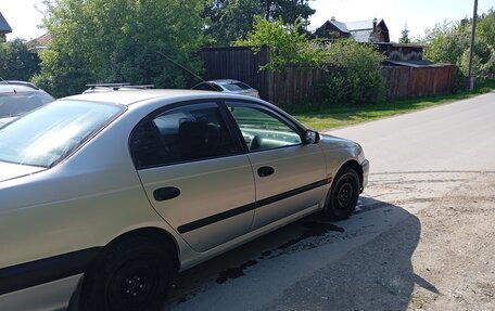 Toyota Avensis III рестайлинг, 2003 год, 460 000 рублей, 10 фотография
