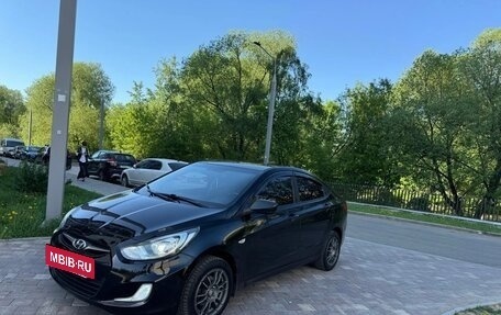 Hyundai Solaris II рестайлинг, 2011 год, 695 000 рублей, 10 фотография