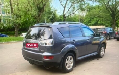 Mitsubishi Outlander III рестайлинг 3, 2010 год, 955 000 рублей, 4 фотография