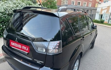 Mitsubishi Outlander III рестайлинг 3, 2011 год, 1 400 000 рублей, 10 фотография