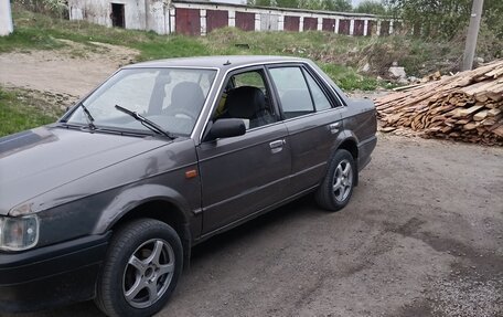 Mazda 323, 1986 год, 200 000 рублей, 3 фотография