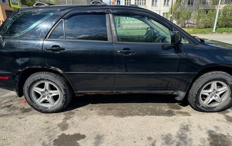 Lexus RX IV рестайлинг, 2000 год, 680 000 рублей, 7 фотография