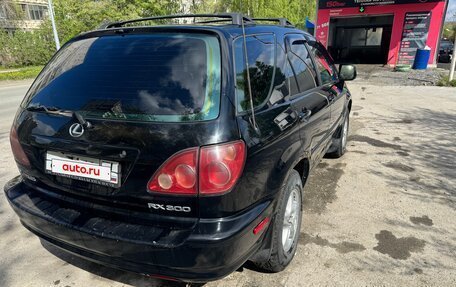 Lexus RX IV рестайлинг, 2000 год, 680 000 рублей, 4 фотография