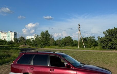 Mazda Familia Y10, 1998 год, 250 000 рублей, 4 фотография