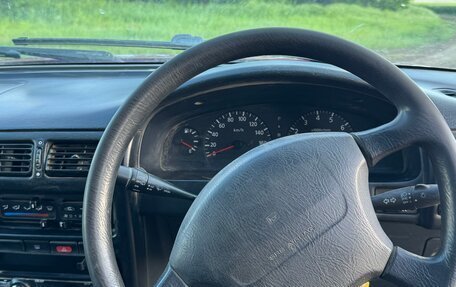 Mazda Familia Y10, 1998 год, 250 000 рублей, 10 фотография