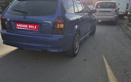 Mazda Familia, 2000 год, 4 фотография