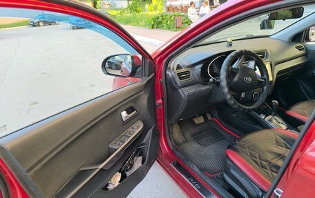 KIA Rio III рестайлинг, 2013 год, 1 100 000 рублей, 23 фотография