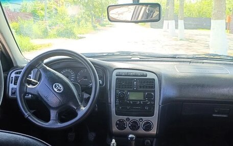 Toyota Avensis III рестайлинг, 2001 год, 225 000 рублей, 6 фотография