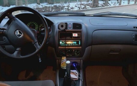 Mazda 323, 2000 год, 350 000 рублей, 6 фотография