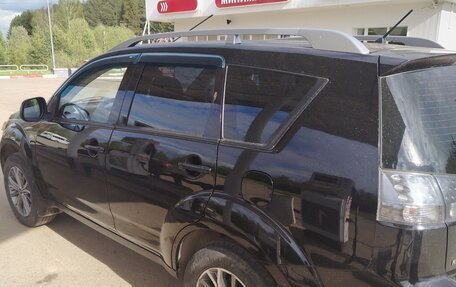 Mitsubishi Outlander III рестайлинг 3, 2008 год, 990 000 рублей, 4 фотография