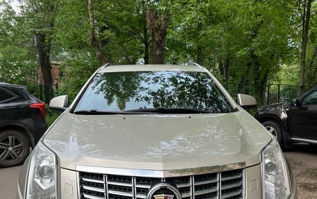 Cadillac SRX II рестайлинг, 2014 год, 1 850 000 рублей, 1 фотография