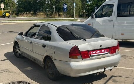 Mitsubishi Carisma I, 1997 год, 100 000 рублей, 3 фотография