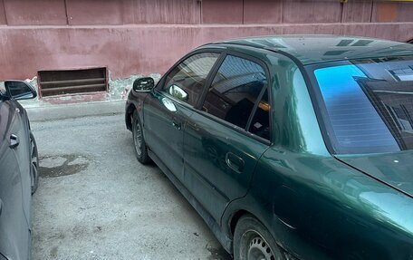 Mitsubishi Carisma I, 1998 год, 80 000 рублей, 3 фотография