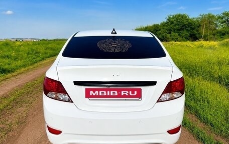 Hyundai Solaris II рестайлинг, 2013 год, 666 666 рублей, 18 фотография