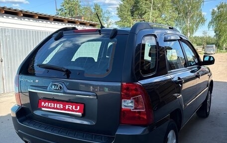 KIA Sportage II, 2009 год, 950 000 рублей, 13 фотография