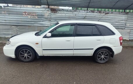 Mazda Familia, 2001 год, 315 000 рублей, 32 фотография