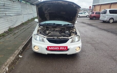 Mazda Familia, 2001 год, 315 000 рублей, 34 фотография