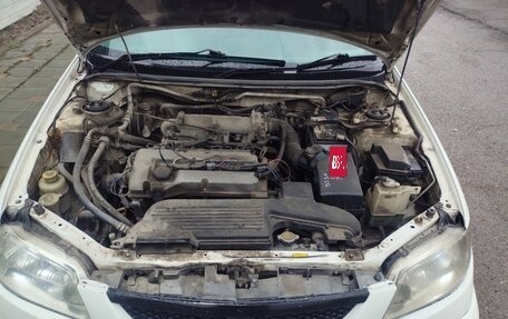 Mazda Familia, 2001 год, 315 000 рублей, 39 фотография