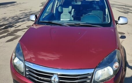Renault Sandero I, 2013 год, 650 000 рублей, 2 фотография