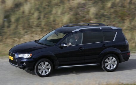 Mitsubishi Outlander III рестайлинг 3, 2010 год, 850 000 рублей, 1 фотография