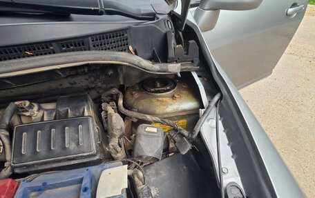 Nissan Tiida, 2012 год, 870 000 рублей, 24 фотография