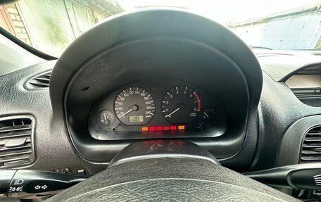 Mitsubishi Carisma I, 2002 год, 170 000 рублей, 24 фотография