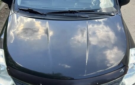 Nissan Tiida, 2010 год, 700 000 рублей, 8 фотография