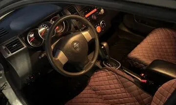 Nissan Tiida, 2010 год, 620 000 рублей, 5 фотография