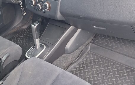 Nissan Tiida, 2010 год, 595 000 рублей, 9 фотография