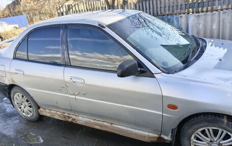 Mitsubishi Mirage VI рестайлинг, 1997 год, 120 000 рублей, 4 фотография