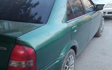 Mazda Protege, 1999 год, 250 000 рублей, 4 фотография