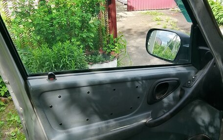 Chevrolet Niva I рестайлинг, 2003 год, 300 000 рублей, 11 фотография