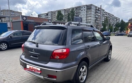 Mitsubishi Outlander III рестайлинг 3, 2007 год, 830 000 рублей, 4 фотография