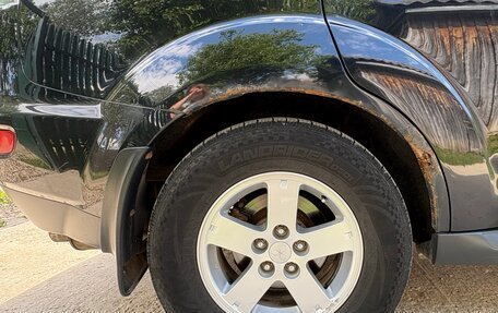 Mitsubishi Outlander III рестайлинг 3, 2011 год, 900 000 рублей, 19 фотография