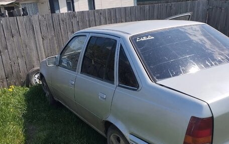 Opel Kadett E рестайлинг, 1991 год, 50 000 рублей, 4 фотография