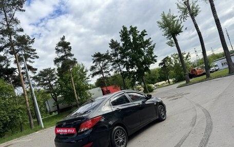 Hyundai Solaris II рестайлинг, 2011 год, 587 000 рублей, 3 фотография