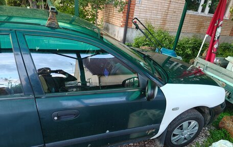Mitsubishi Carisma I, 1999 год, 110 000 рублей, 13 фотография