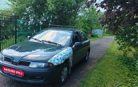 Mitsubishi Carisma I, 1999 год, 110 000 рублей, 28 фотография