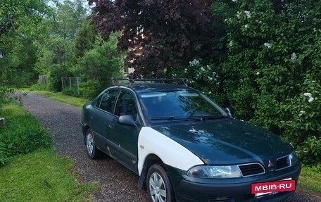Mitsubishi Carisma I, 1999 год, 110 000 рублей, 27 фотография