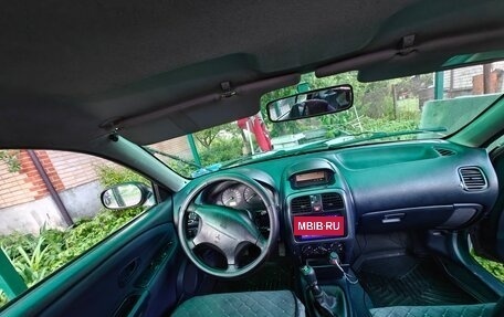 Mitsubishi Carisma I, 1999 год, 110 000 рублей, 22 фотография