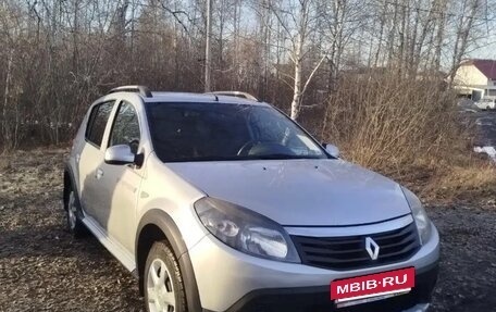 Renault Sandero I, 2013 год, 670 000 рублей, 2 фотография