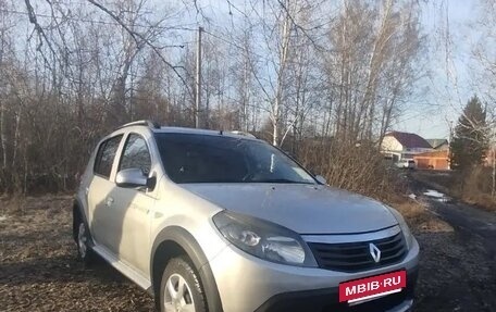 Renault Sandero I, 2013 год, 670 000 рублей, 3 фотография