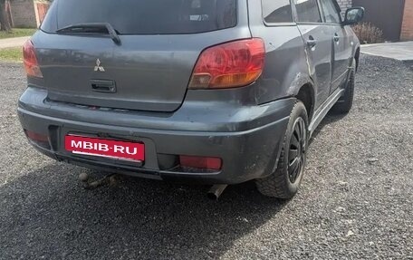 Mitsubishi Outlander III рестайлинг 3, 2004 год, 370 000 рублей, 2 фотография