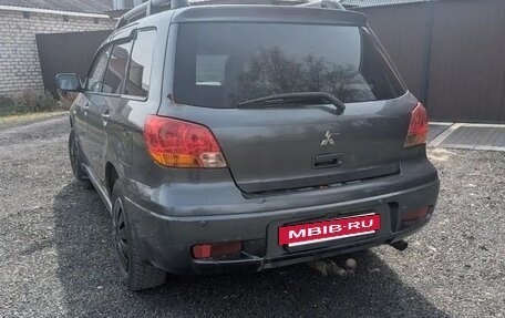 Mitsubishi Outlander III рестайлинг 3, 2004 год, 370 000 рублей, 4 фотография